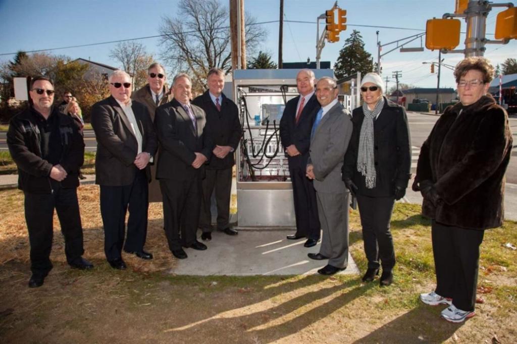 The Monmouth County Board of Chosen Freeholders are joined by Bradley Beach Mayor Gary Engelstad, Neptune City Mayor Robert Brown and Neptune City Council members at the activation ceremony for a new traffic signal at the intersection of Memorial Drive and Evergreen Avenue on Nov. 14. Pictured left to right: Councilman Pryor, Councilman Cross, Councilman More, Mayor Brown, Mayor Engelstad, Freeholder Curley, Freeholder Arnone, Councilwoman Mitchell and Councilwoman Shafer.